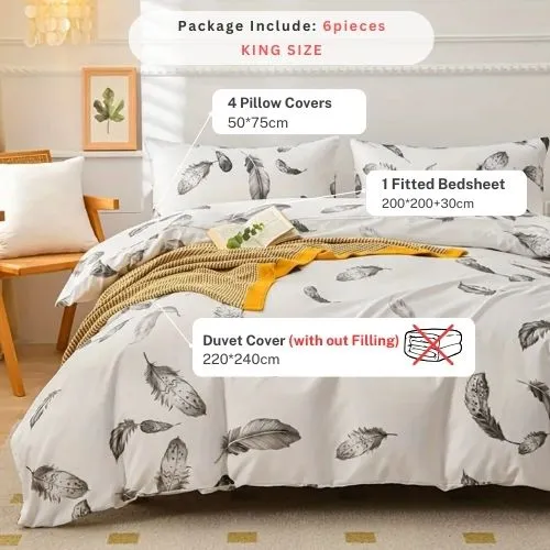 King size 6 piece duvet cover set, white bed linen with gray feathers.